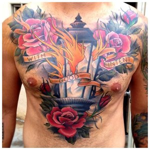 Яркие большие цветы - тату на грудь мужчине