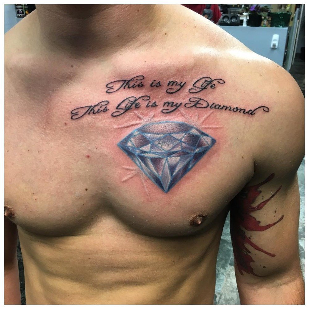 татуировки для мужчин на грудь надписи фото 64