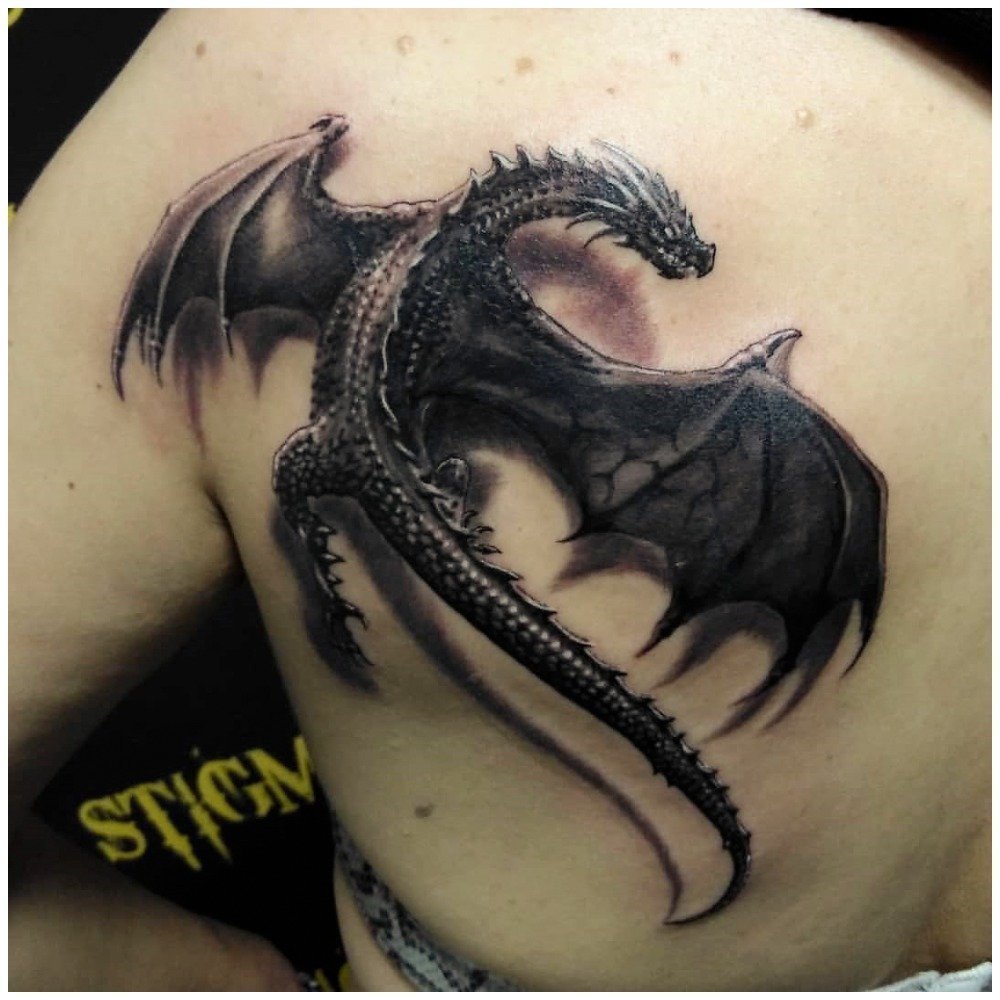 Татуировки дракона на лопатке мужские