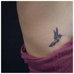 Татуировка возле груди
